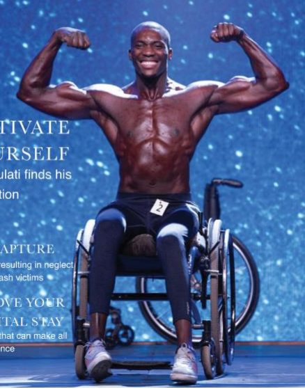 Macethandile 'Max' Kulati — front double bicep pose on the IBFF World Championship stage